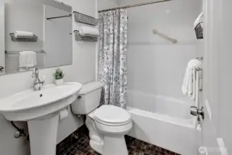 Light and bright full bathroom off the bedroom.