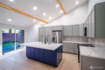 Modern architecturally designed kitchen with lots of counter space and a HUGE island