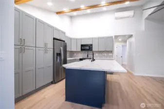 Lots of cabinet space, designer backsplash