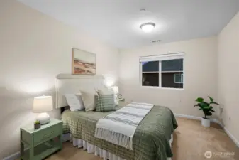 One of the nice sized upstairs bedrooms. There is a linen closet upstairs too!