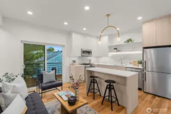 Open kitchen and dining area designed for connection and conversation.