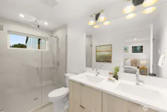 Spa-inspired bath with dual vanities and plenty of storage for a clutter-free feel.