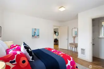 Closet off of bedroom with a window in it for natural light