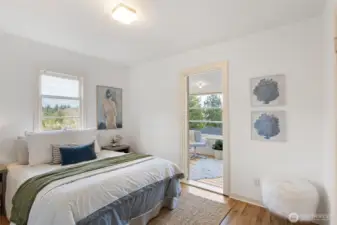 2nd bedroom with wood floors