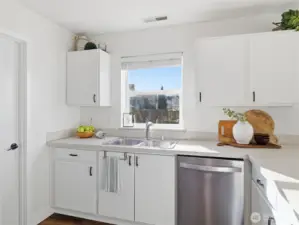 kitchen sink w/ window to the backyard
