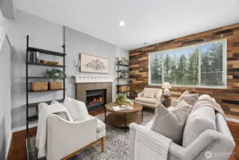 Cozy living room with gas burning fireplace.