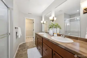 Primary ensuite features a large shower, dual sinks and plenty of counter space.