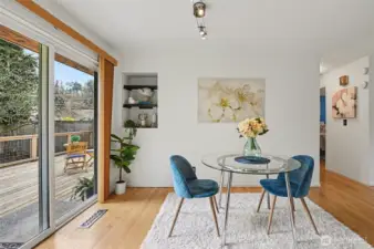 Delightful dining area with access to the entertainment-sized deck & private fully-fenced yard.