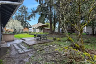 Shy quarter acre lot boasts a fully fenced back yard and is  waiting for your design ideas