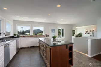Views to Burrows bay and Burrows island from your kitchen counters. Right are the stairs leading to lower level.