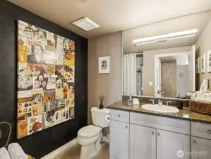 Main bathroom complete with shower stall for stay over guests.