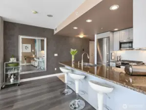 In the distance is a Roman Clay feature wall adding texture and warmth to this stunning home!
