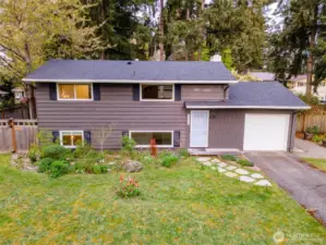 One car attached garage with ample driveway parking.