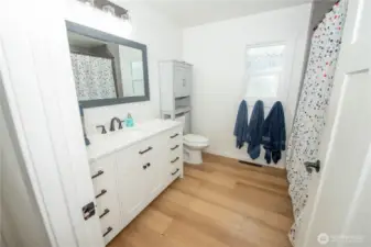 Main bath has plenty of room, and an XL tub.