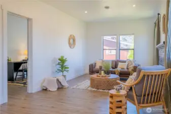 The living room is open to the two bedrooms