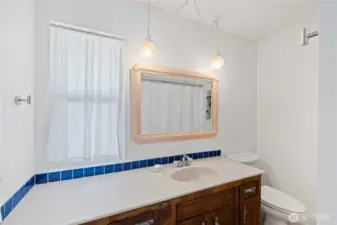 Full Bathroom with storage.