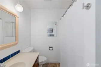Full bathroom on the right side when you enter.