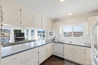 Look at the water views from the Kitchen.  Slate flooring and lots of storage in the kitchen area.