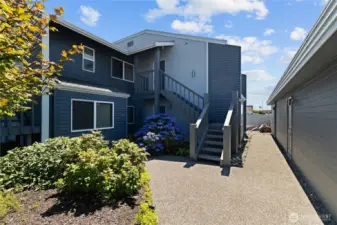 The Stairs and stairway is brand new, replaced and painted.  The door on the right at the end is the convenient garage.  Top floor, end unit.