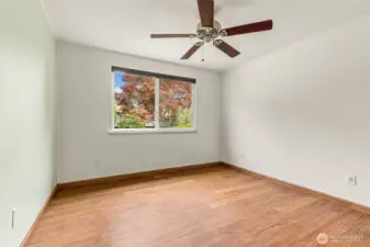 1st bedroom looks into backyard