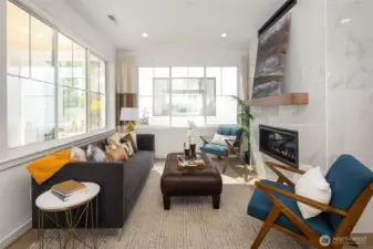 Huge windows create a bright and enlivening living space.