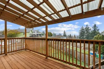 Newer back deck located just off the kitchen makes outdoor entertaining easy.