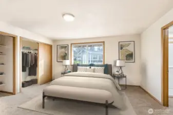 Primary suite on main level with new carpet- two closets & attached 3/4 bathroom.