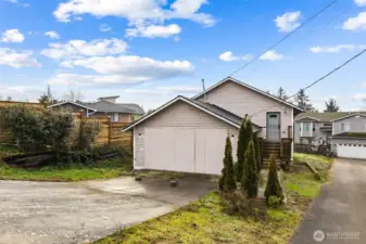 Low maintenance yard with plenty of driveway parking- on the entry side of the garage is a man door leading to the font door of home. Other features of this home are a new garage door with openers + 2 year old roof!