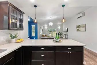Open Concept Kitchen view to a second living space
