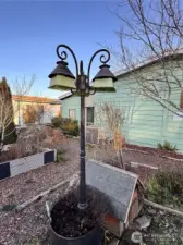 Beautiful lamp conveys in the garden