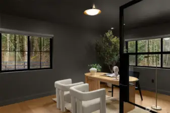 A dramatic color-drenched main floor office creates a rich feel