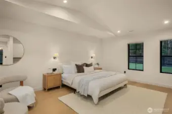 Primary suite has views of the tranquil estate