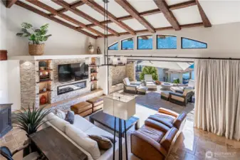 Double-height great room with elegant architectural detailing.