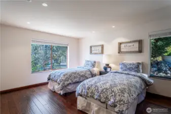 Additional bedroom suite ideal for guests or family.