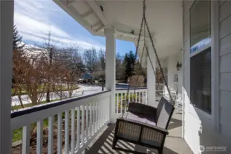 enjoy the porch swing overlooking the front yard