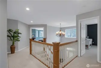 hallway to additional bedrooms