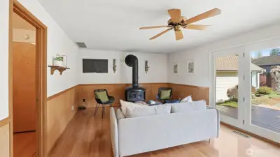 The family room offers a cozy gas fireplace.