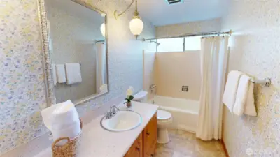 Full guest bathroom on the upper level.