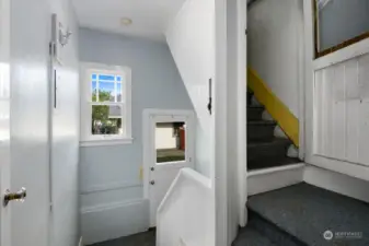 Stairs from kitchen to unfinished attic, backyard & basement
