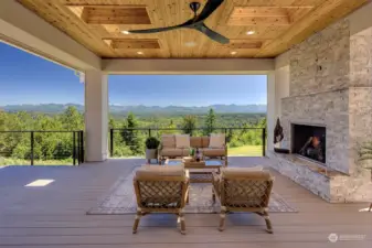 Living the Life on outdoor deck with gas natural stone fireplace, 180 degree views of North Cascades (on a clear day Mt.Baker too!). Timber Tec Advanced PVC deck (fifty year warranty), skylights,tongue and groove tight know cedar ceiling!