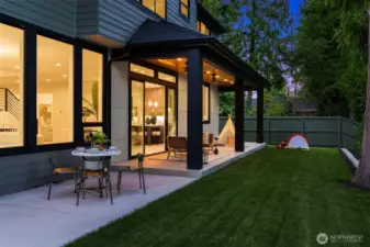 Covered patio featuring skylights, ceiling fans, and built-in speakers—perfect for outdoor entertaining.