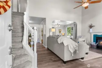 Entry with soaring ceilings and brand-new vinyl flooring