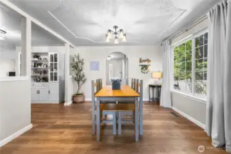 Box beam ceilings, coved passthroughs, an abundance of windows
