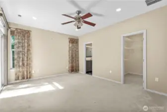 Elegant Main Floor Living. Step into the inviting main floor, where you’ll find the spacious primary suite thoughtfully designed for comfort and privacy.
