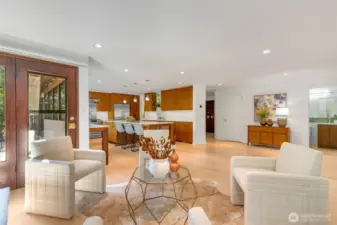 This shows the scale of the generous spaces and how they connnect to the powder room, entry and kitchen