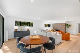 Note the scale of this rec room. It is large enough to support a generous sectional, game table, and more