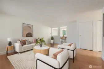 Open and bright formal living area with coat closet and linen closet. Engineered hardwood  floors and fresh paint.
