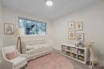 Virtually staged. 3rd bedroom with brand new carpet, large closet, fresh paint and all new lighting.