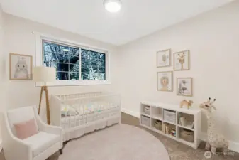 Virtually staged. 3rd bedroom with brand new carpet, large closet, fresh paint and all new lighting.