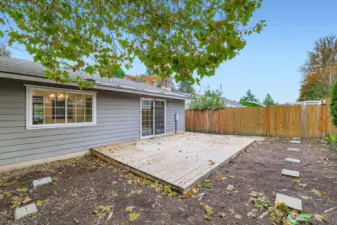 Huge BBQ deck off family room and kitchen. Great for playing and entertaining!
